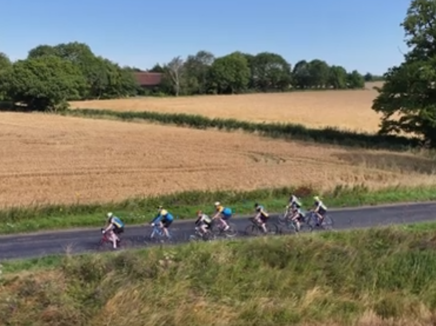 Group of riders in open countryside
