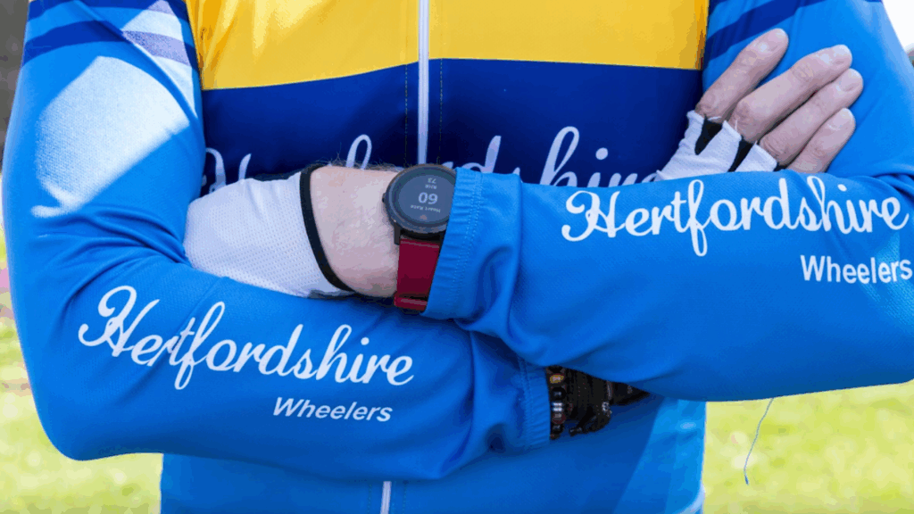 Close-up of rider in Wheelers' kit with arms folded